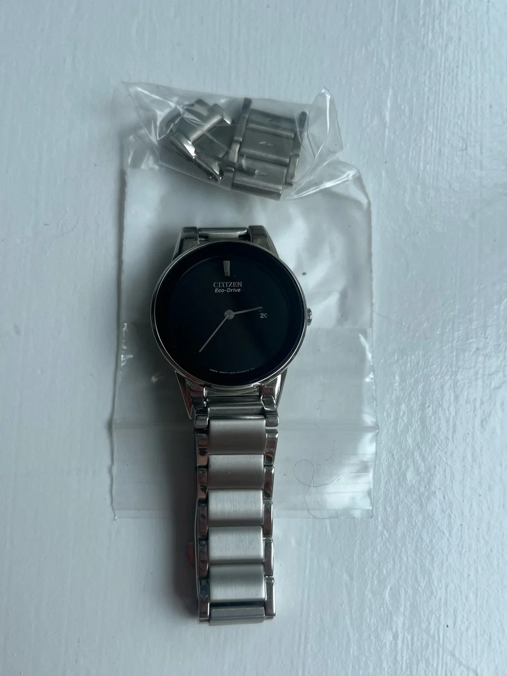 NEW Citizen AU1060-51E Eco-Drive Axiom Watch Stainless, Faceless Black Dial woma
